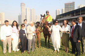 Psychic Star (Vivek G up), winner of Indian 1000 Guineas being led in by winning connections including Vijay Shirke, breeder Ameeta Mehra and trainer Pesi Shroff. Photo credit Amit Gupta